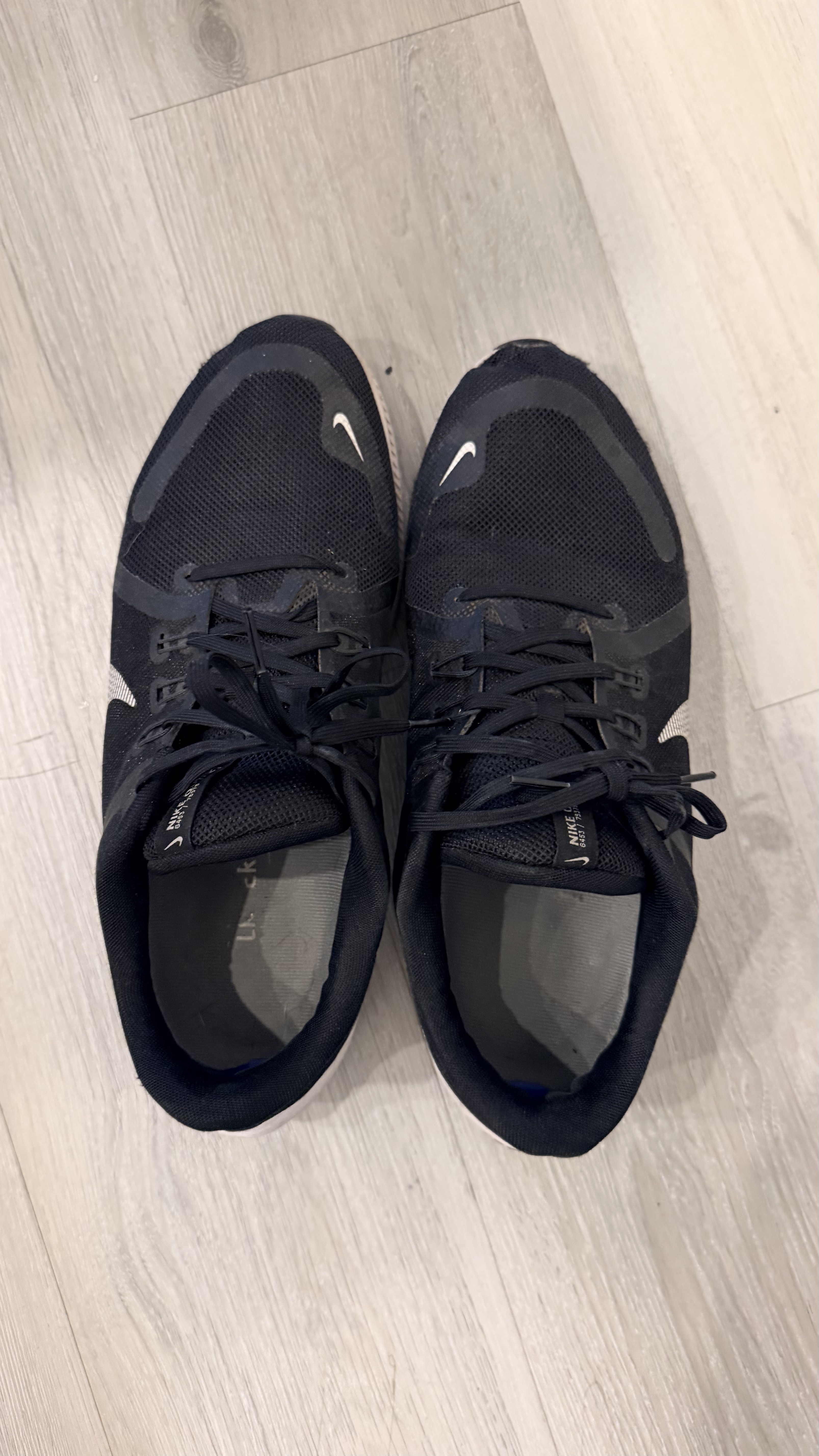 Black Nike athletic sneakers