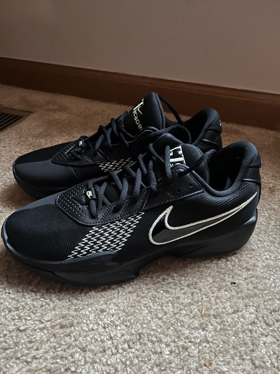 Black Nike basketball shoes